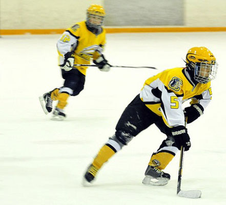 Coquitlam Chiefs Players wearing LAGA Sports hockey jersey and hockey socks image 2