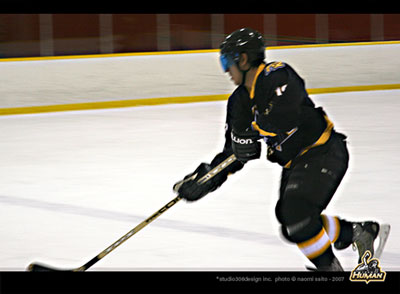 HT2 player on breakaway in hockey jerseys