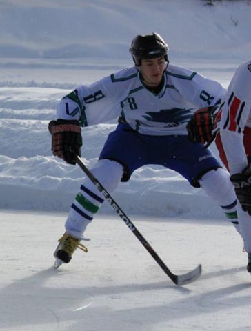 Varion Huskies player in defensive action