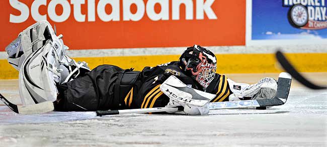 Dawson City Nuggets goalie makes a save 